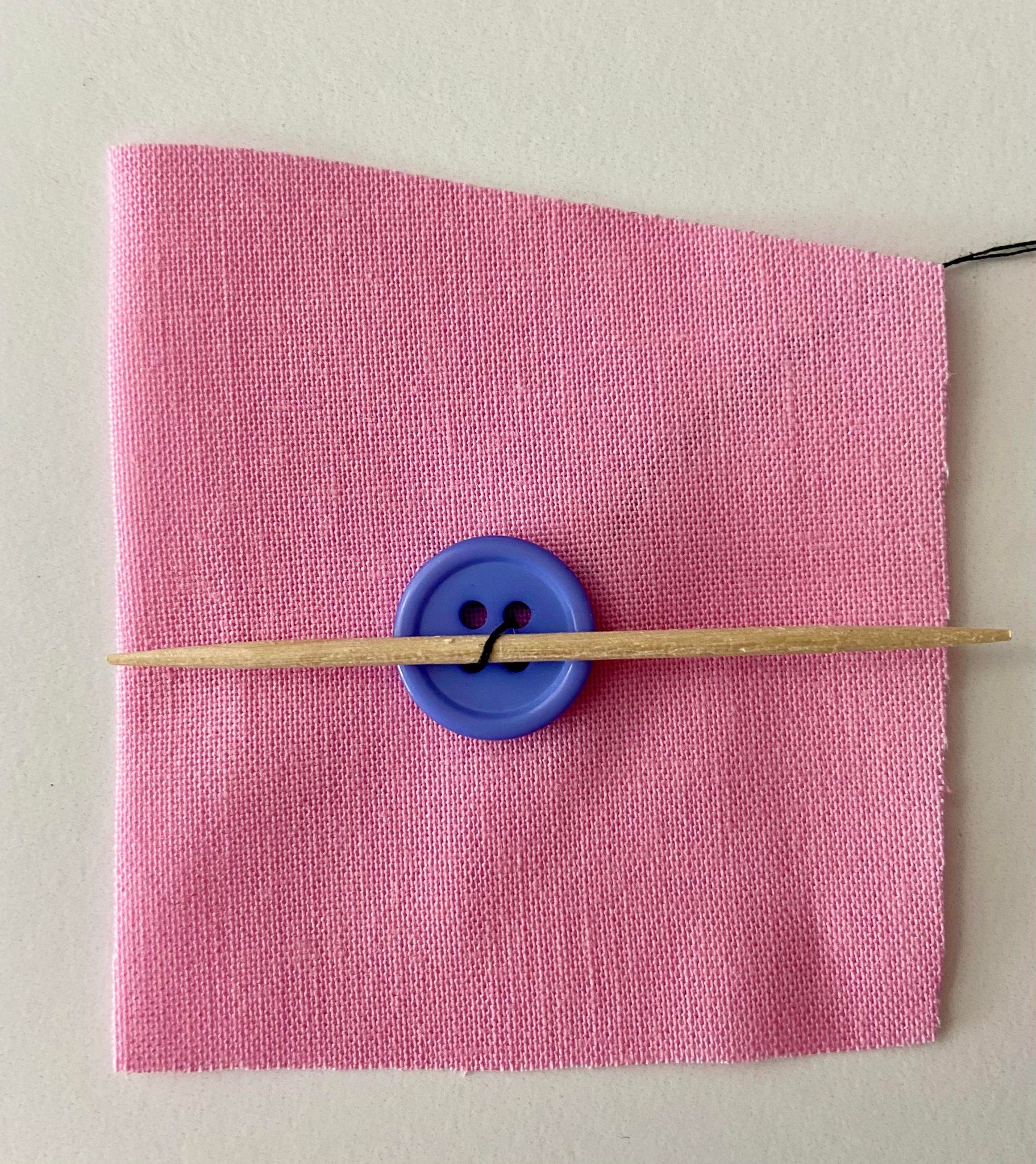 How to Sew on a Four or Two Hole Button by Hand