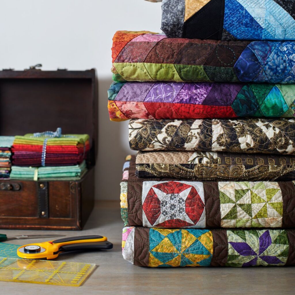 stack of quilts.