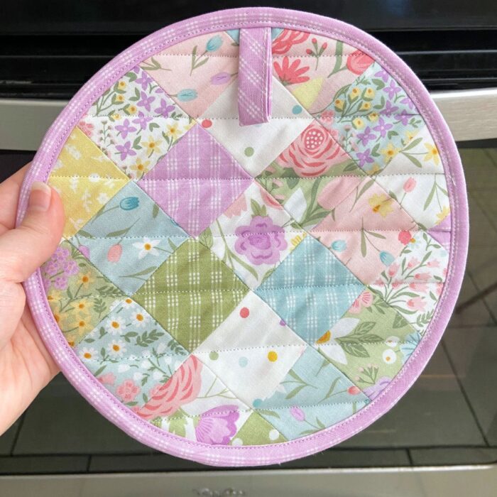 Pot holder in front of a oven.